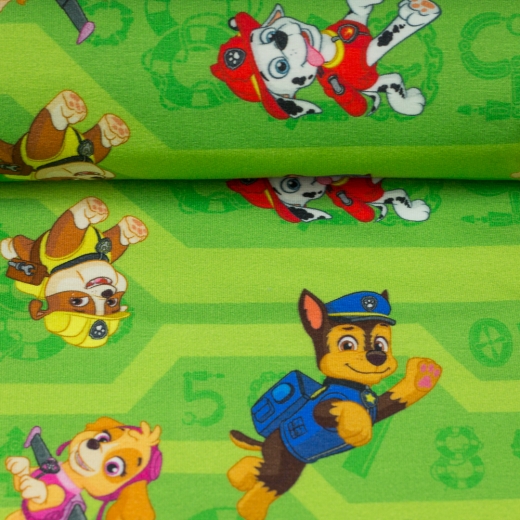 Paw Patrol springende Hunde auf grün Jersey Baumwolle
