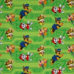 Paw Patrol springende Hunde auf grün Jersey Baumwolle